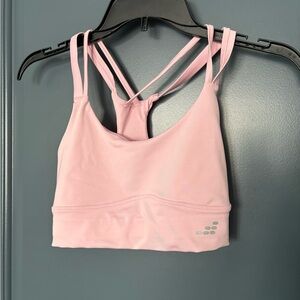 BCG Light Pink Sports Bra. open straps back. Able to put pads inside cups